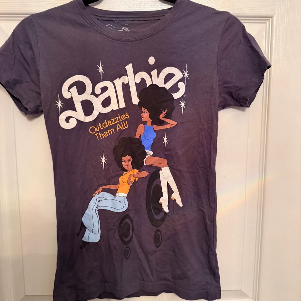 Vintage Black Barbie “Outdazzles Them All!” Graphic Tee